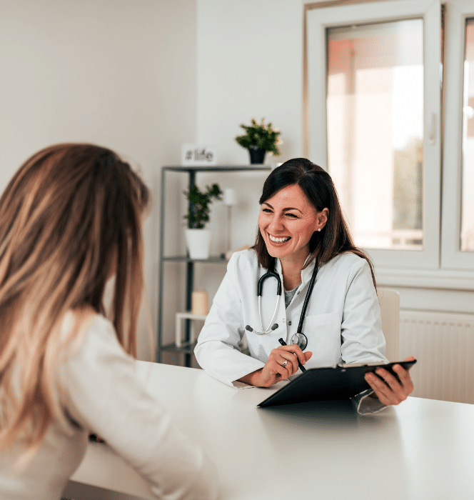 Female doctor talking to patient